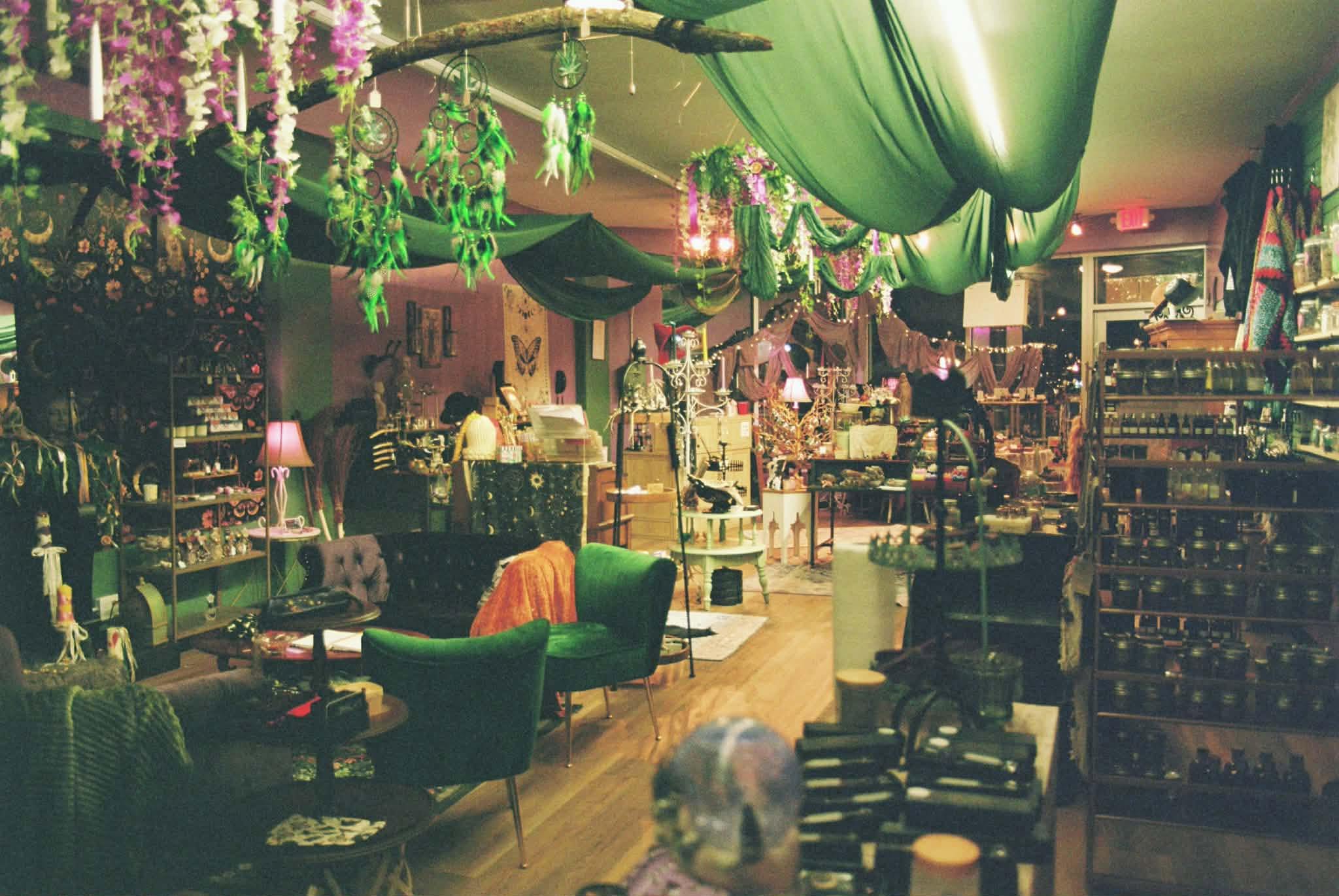 Warmly lit interior of Grimoire Girls Coven